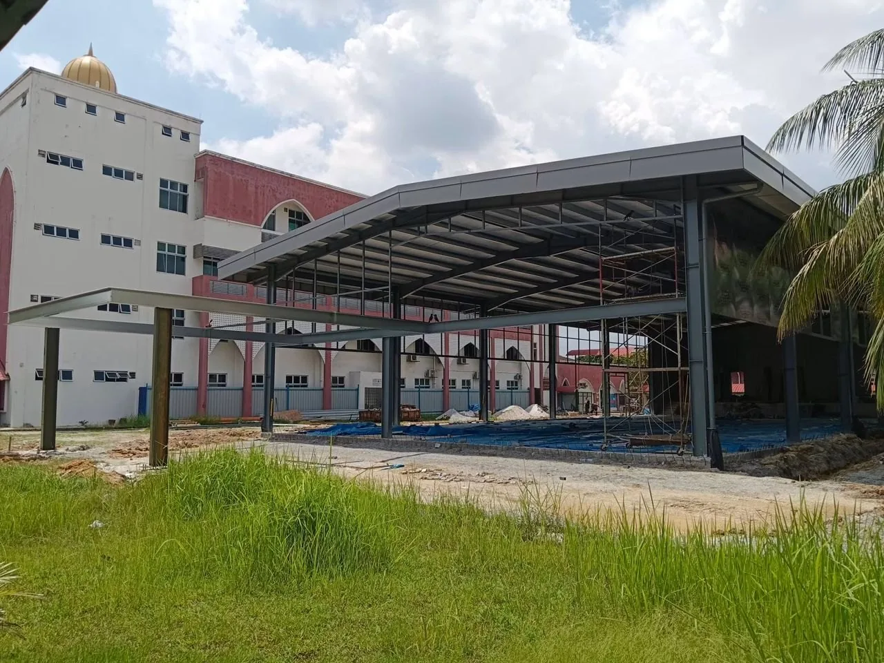 Commercial steel canopy structure with metal roofing